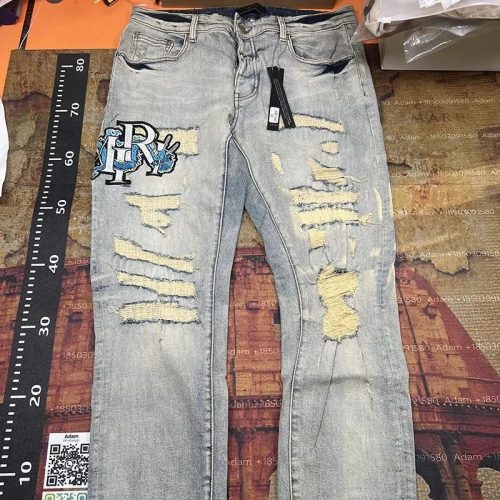 Amiri MX1 Distressed Slim Fit Jeans Light Blue