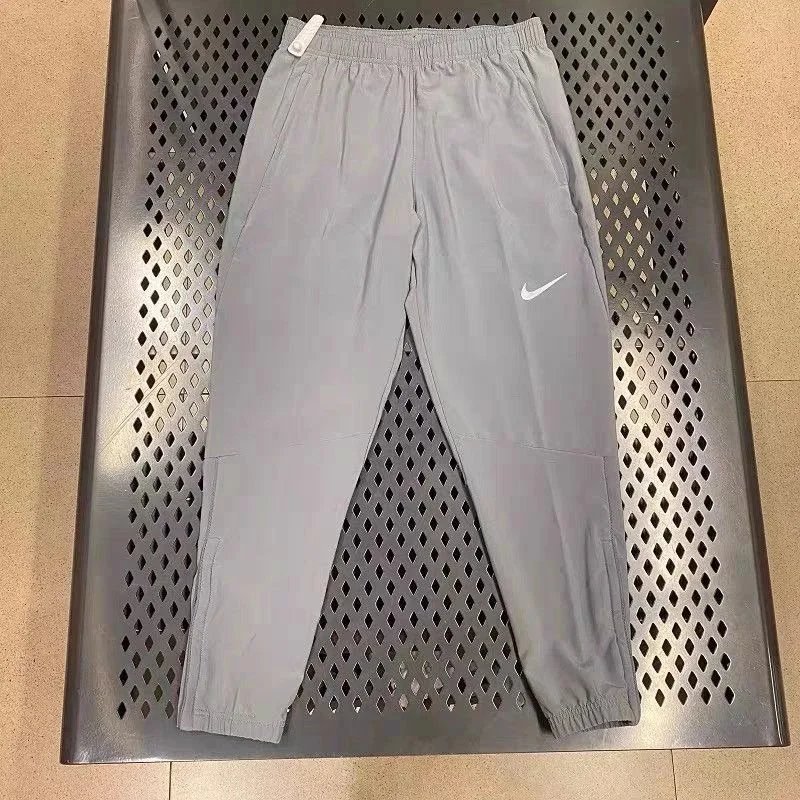 Nike 灰色束脚裤